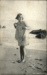 Photograph of Woman Wrapped in Towel on the Beach Postcard