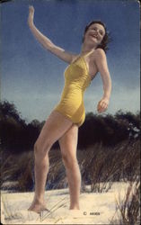 Brunette on the Beach in Yellow Swimsuit Swimsuits & Pinup Postcard 
