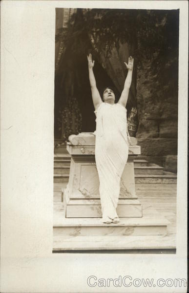 Person in a Toga Stretching Arms toward the Sky
