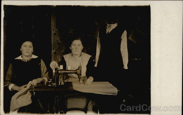 Two Dressmakers at Sewing Machine
