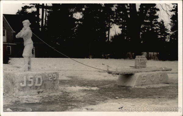 Ice Sculputre of Man Pulling Log Raft Carrying Barrell