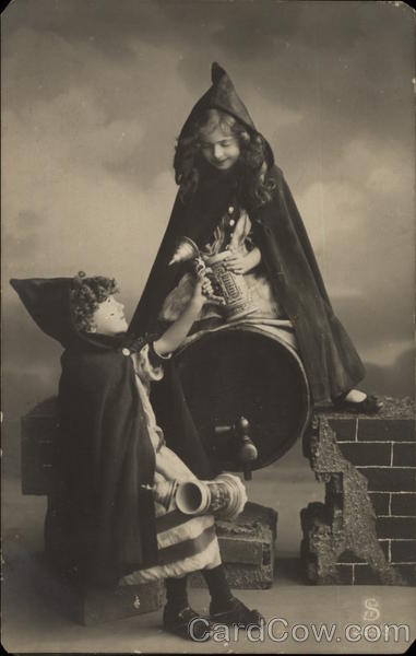 Two Girls Dressed Up in Capes Children