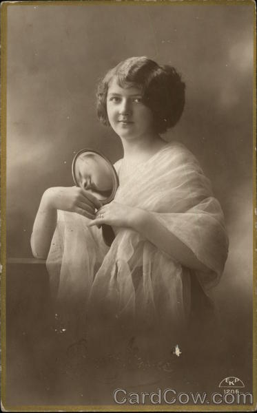 Young Woman in Chiffon Shawl holding Hand Mirror Women