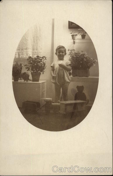 Young Boy in a Nursery Full of Flowers Boys