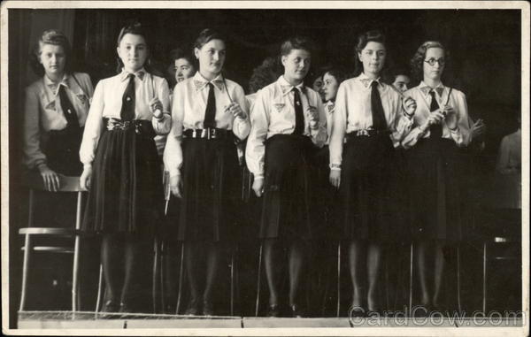 Women on a Stage in Uniform