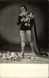 Actor wearing Cape & Tights on Stage with Flowers Postcard