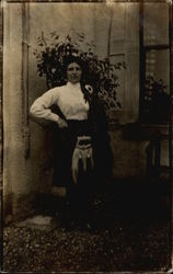 Woman in Kilt Postcard