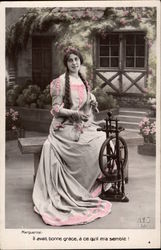 A Woman with Long Braids by a Spinning Wheel Postcard