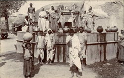 Tribal People with Pots at a Well Postcard