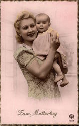 Blonde Woman Holding Baby Postcard