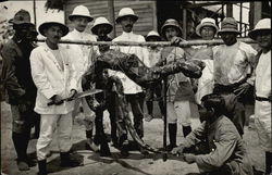 Hunters Displaying Captured Python Postcard