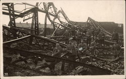 Group of Soldiers by Scrap Metal Postcard