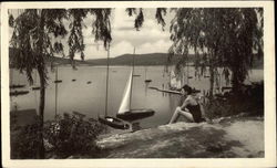 Woman by the Waterfront with Sailboats Woman by the Waterfront with Sailboats