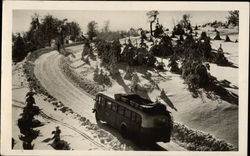 Bus Traveling up Snow-covered Road Bus Traveling up Snow-covered Road