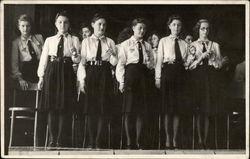 Women on a Stage in Uniform Postcard