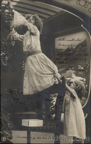 Girls Decorating Christmas Tree Children