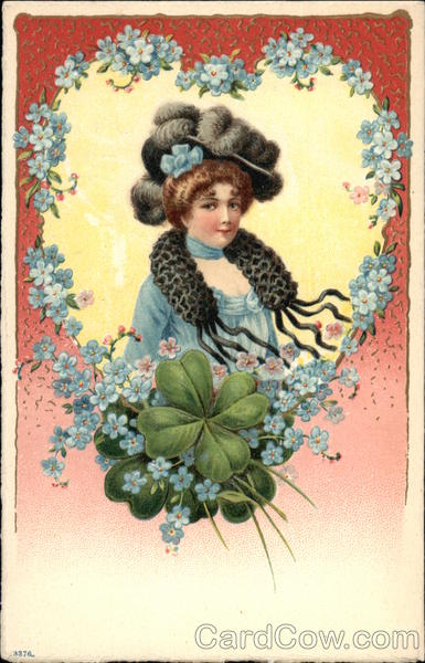 Woman wearing Large Plumed Hat framed with Blue Flowers & Shamrocks
