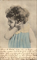 Little Girl in Blue Listening to a Pocket Watch Postcard