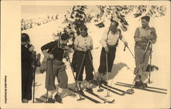 Group on the Slope wearing Snow Skis Group on the Slope wearing Snow Skis