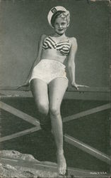 Woman in Sailors Hat, Striped Top and White Shorts Arcade Card