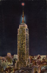 The Empire State Building & Television Tower at Night Postcard