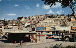 Looking across the International Boundary into Mexico Nogales, AZ Postcard Postcard