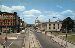 U.S. Post Office on Right, Looking North towards Main Shopping District Postcard