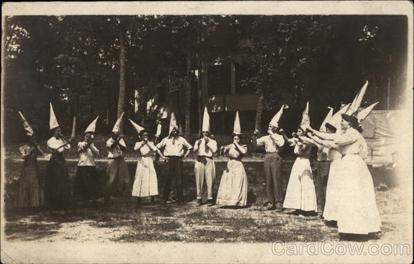 Men and Women in Party Hats Play Game