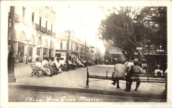 Men Sitting on Benches in the Plaza Vera Cruz Mexico