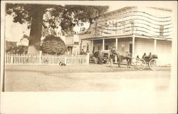 View of Horse Carriage in Front of Buildings Postcard