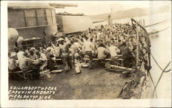 USS Texas - Sailors Enjoying a Hearty Meal Topside Postcard