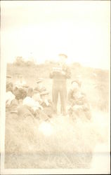 Sailors Lying in Field Postcard