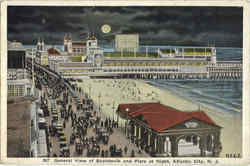 General View Of Boardwalk And Piers At Night Postcard