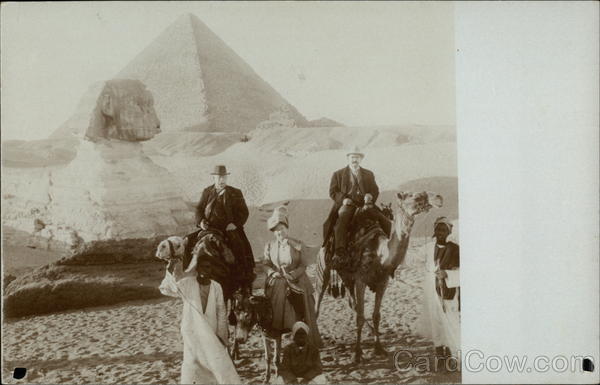 Sphinx, Pyramid and Tourists on Camels Giza Egypt Africa