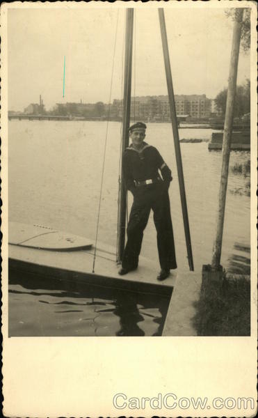 Sailor on His Small Sailboat Men