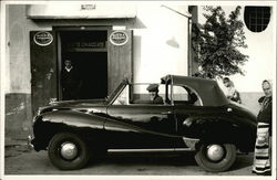 Man in His New Car Outside the Bibite Schiacciate Pub Postcard