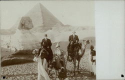 Sphinx, Pyramid and Tourists on Camels Giza, Egypt Africa Postcard Postcard
