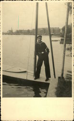 Sailor on His Small Sailboat Postcard