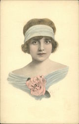 Woman in Blue Dress With Headband and Pink Flower on Chest Postcard