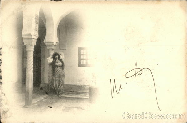 Woman in Native Dress Posing in Courtyard Arab