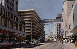 Third Avenue View - New Passenger Overpass from Multi-floored Parking Facility to Bon Marche Postcard
