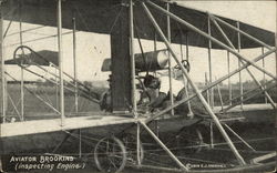 Aviator Brookins - Inspecting Engine of Biplane Postcard