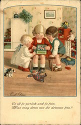 Three Children Looking in Box Postcard
