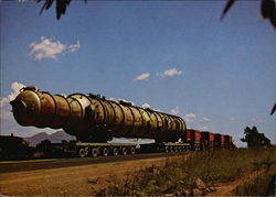 An abnormal load en route with the S.A.R. Road Transport Service Postcard