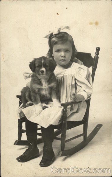 Girl and Dog in Rocking Chair Girls
