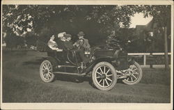Two Couples in a Great Smith Automobile Postcard