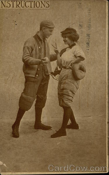 A Male Pitcher and Female Catcher Discuss Signals Baseball