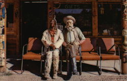 Prospector Pete and Injun Joe Sitting in Front of the Buffalo Bill Shop Greeting Visitors Cody, WY Postcard Postcard