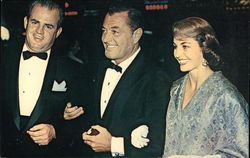 Cyd Charisse and Husband, Tony Martin Arrive at the Glamourous Hollywood Premiere Postcard