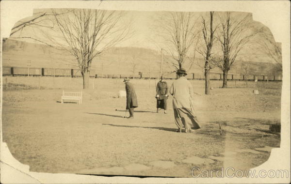 Ladies Play A Game of Croquet